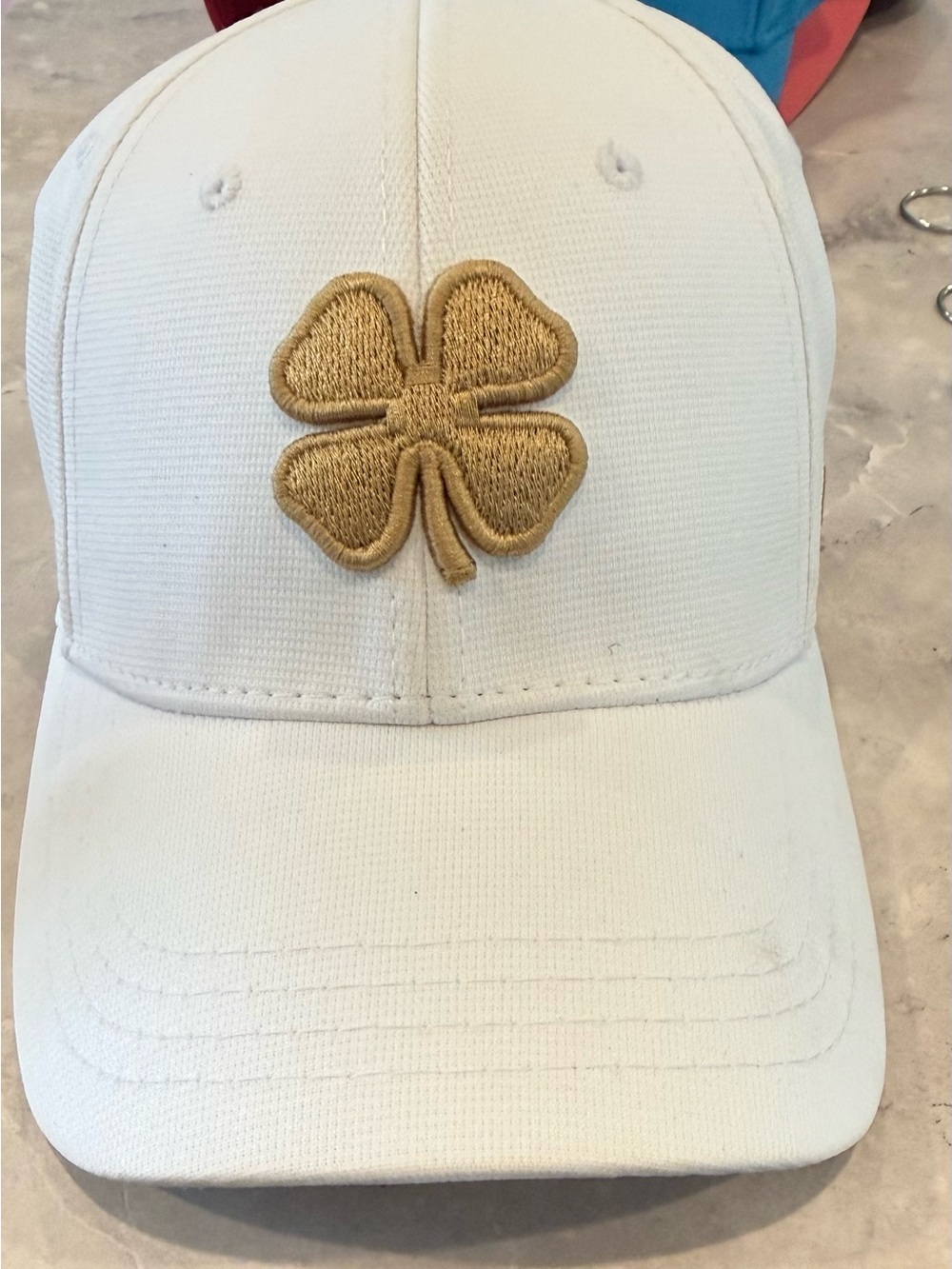 Black clover brand White Baseball Cap with Gold Four-Leaf Clover Patch
